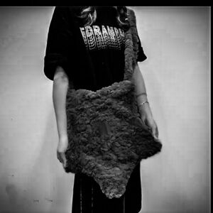 Black fuzzy star purse